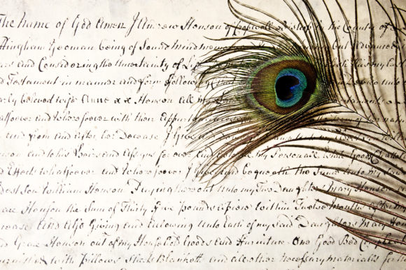 Peacock Feather on Antique Handwritten